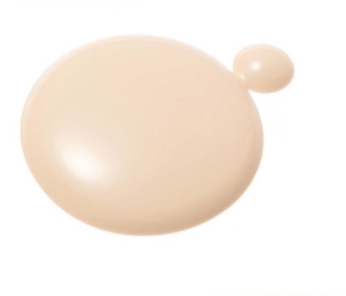 A beige egg with a small round attachment on one side.