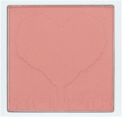 A pink makeup product with a heart-shaped outline and some lines inside, designed for cheeks or lips.