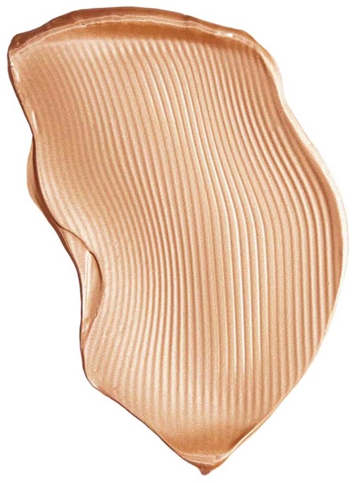 A swatch of cream-colored, shimmery makeup with horizontal ridges and a curved shape.