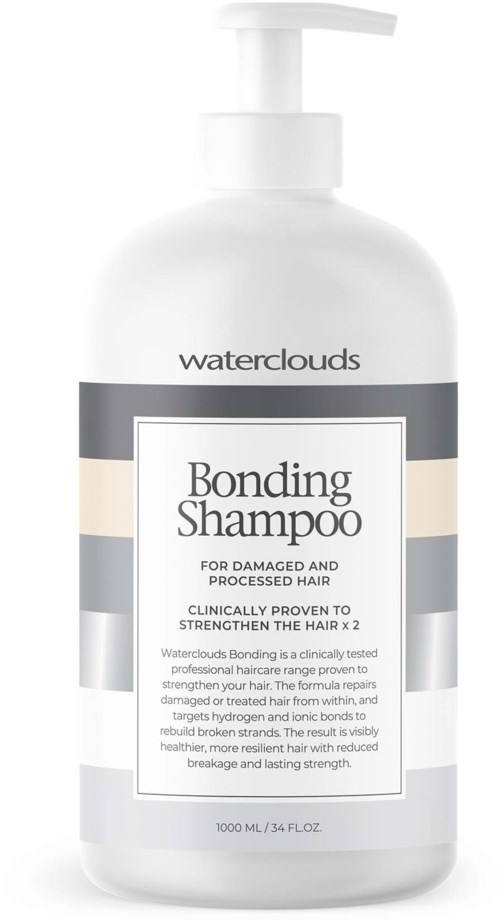 En hvit flaske med pumpe, merket Waterclouds Bonding Shampoo for skadet hår, 1000 ml størrelse.