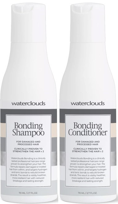 Kaksi valkoista pulloa, jotka on merkitty Bonding Shampoo ja Bonding Conditioner, tarkoitettu vaurioituneeseen hiukseen, yksinkertaisilla valkoisilla ja harmailla tarroilla.
