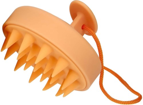 A round yellow massager with many thick spikes and a small orange string for hanging.