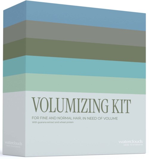 Eine Box mit der Bezeichnung Volumizing Kit für Haare, mit grünen und blauen horizontalen Streifen auf hellem Hintergrund.