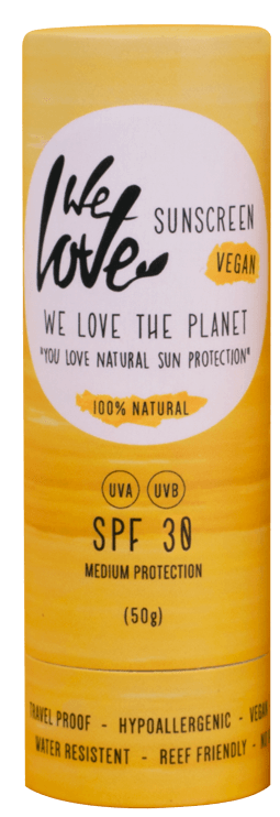En gul flaska med vegansk, naturlig solkräm med SPF 30, märkt som vattentålig och revvänlig.