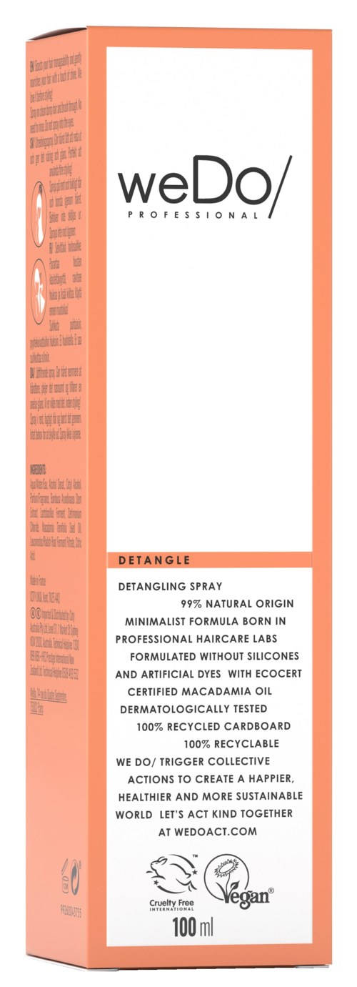 En lang, slank eske med hvit og ferskenfarge, merket 'weDo PROFESSIONAL' og 'Detangle'.