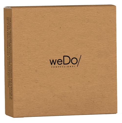 En brun kartonglåda med logotypen 'weDo Professional' på framsidan.