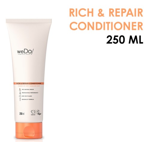 En hvit tube med oransje lokk, merket 'Rich & Repair Conditioner 250 ML', på hvit bakgrunn.