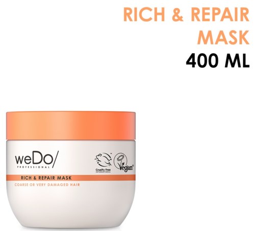 En krukke med weDo RICH & REPAIR MASK for skadet hår, med oransje lokk og tekst på hvit bakgrunn.
