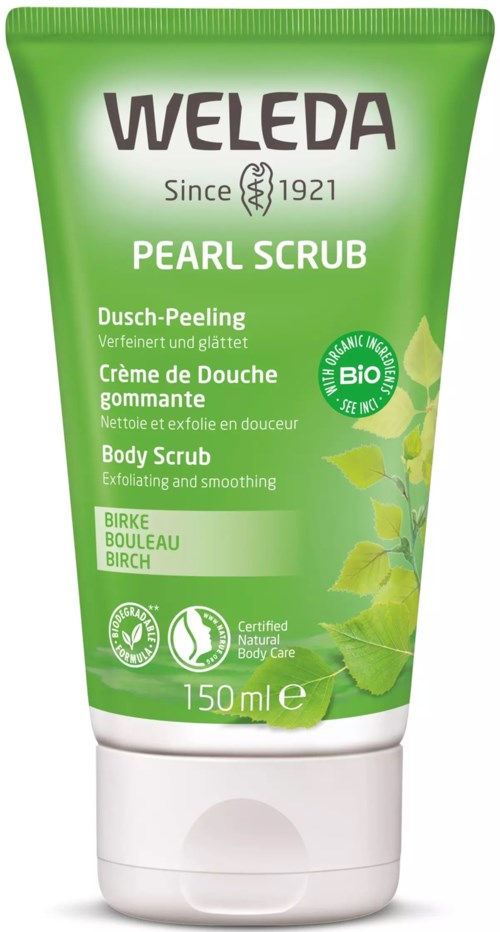Grønn tube av Weleda Pearl Scrub med bjørkeblader og naturlige omslagsmerker.