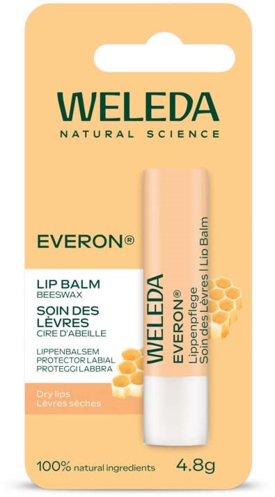 A Weleda lip balm package with beeswax, natural ingredients, and dry lips notice.