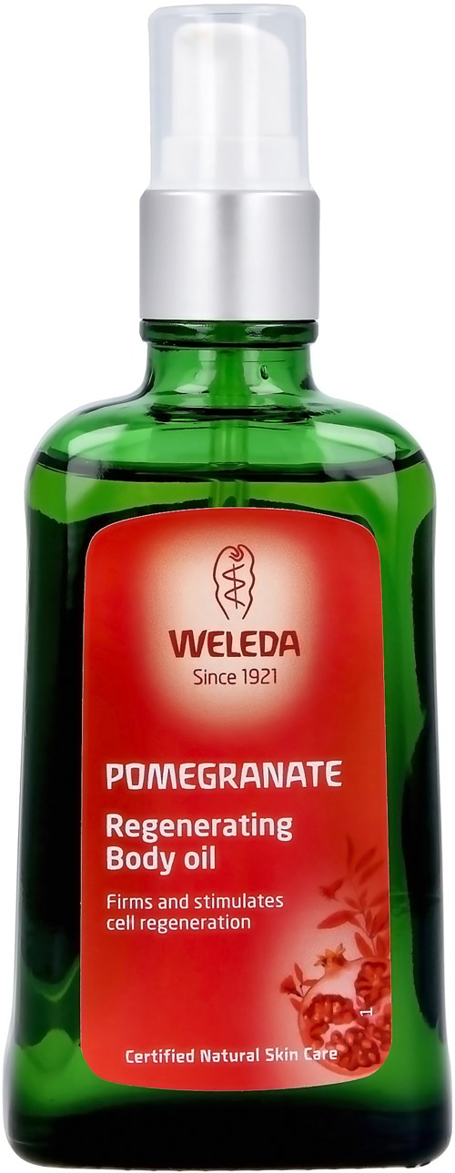 A green bottle with a white pump, labeled 'Weleda Pomegranate Regenerating Body Oil' for skin care.