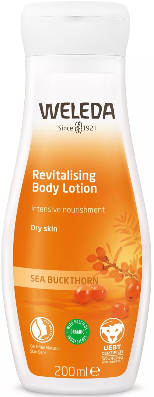 En vit och orange flaska med Weleda kroppslotion för torr hud med havtorn, 200 ml.