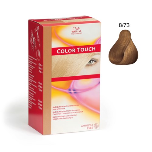 En box med Wella Color Touch hårfärg med ett hårprov i ljusbrunt.