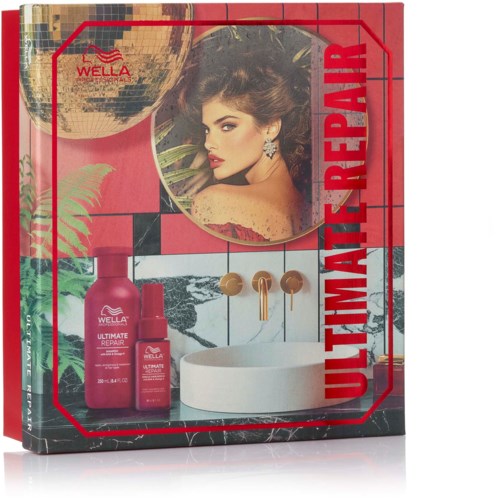 A colorful box with a woman's face, skincare bottles, and the words "Ultimate Repair."