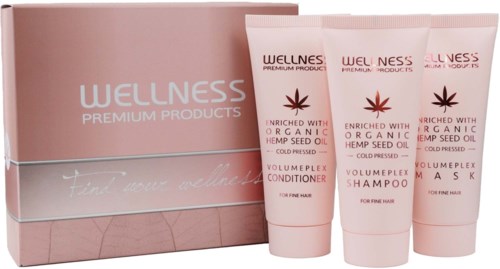Rosa låda med Wellness Premium Products schampo och balsam för fint hår. Organiskt hampfröolja ingredienser.