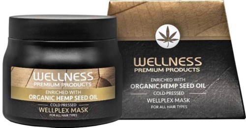 Svart burk och låda med hemp seed oil-hårmasketikett, lövlika logo och brunt och svart förpackning.