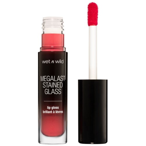 Ett läppglans i ett svart rör med en klar del som visar rosa gloss. Applicatorn har ett rött tips.
