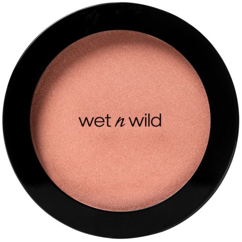 Ein runder Make-up-Container mit peachfarbenem Puder und den Worten "wet n wild".