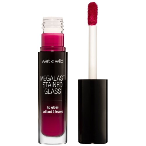 En läppglansrör med rosa gloss, svart lock och applikator. Det är märkt Wet n Wild MegaGlast Stained Glass.