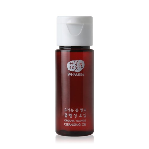 En röd flaska med vit kork märkt "Whamisa Organic Flowers Cleansing Oil" för hudvård.