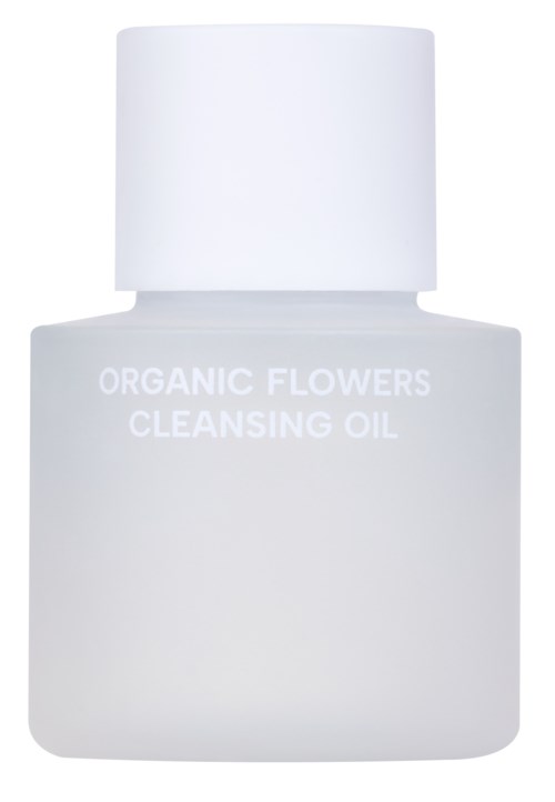 En hvit flaske merket "Organic Flowers Cleansing Oil" med en glatt lokk.