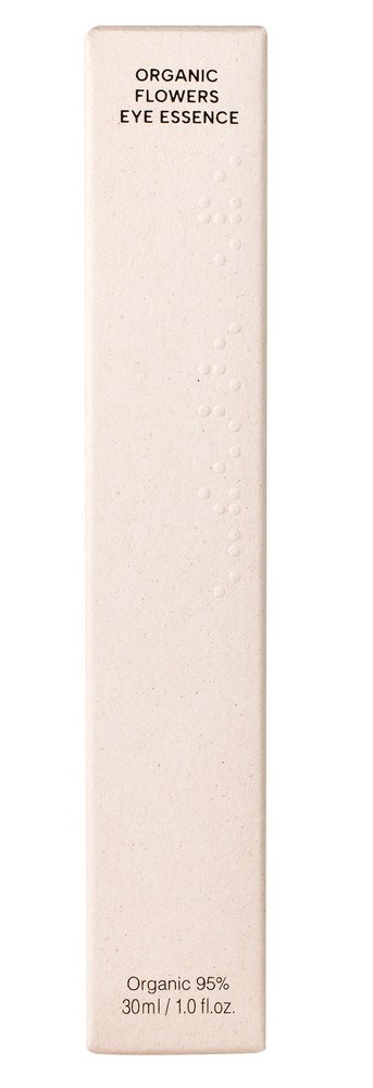 En lang hvit eske med teksten: "Organic Flowers Eye Essence." Små pregete prikker i midten.