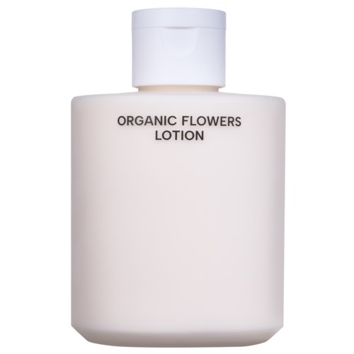 Een witte fles met het label 'ORGANIC FLOWERS LOTION' en een witte dop.