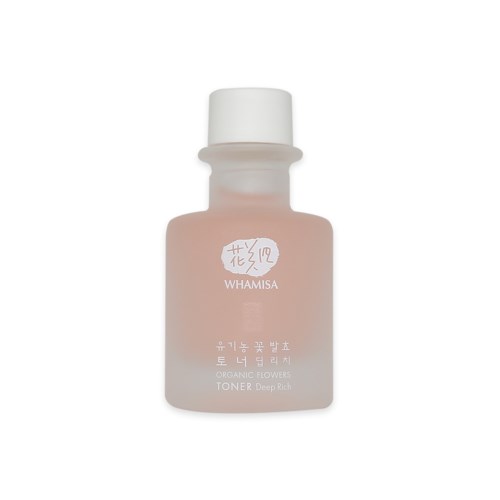 En rosa flaska med vit lock, märkt Whamisa ekologisk toner för djupare hud. Enkel och ren design.
