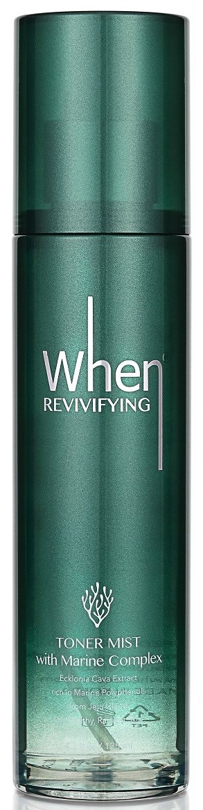 En grön cylindrisk flaska märkt "When Reviving" toner mist med marint komplex inuti.