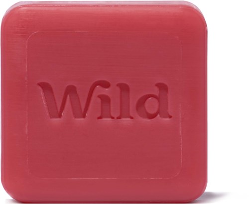 Valkoinen saippua, jossa on sana "Wild" kaiverrettuna.