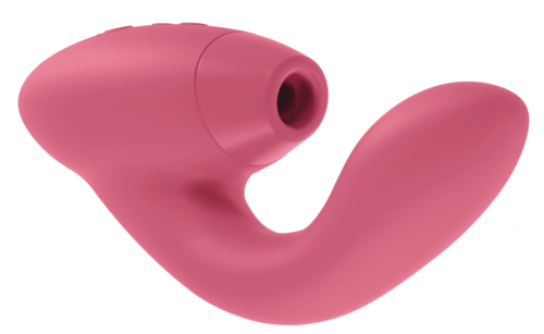 En rosa, böjd enhet med rundad ände och ett hål, troligen ett personvårds- eller hälsogadget.