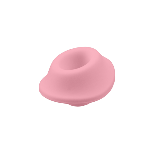 Ett rosa, mjukt utseende föremål med ett hål i mitten, liknande en munk eller ring.