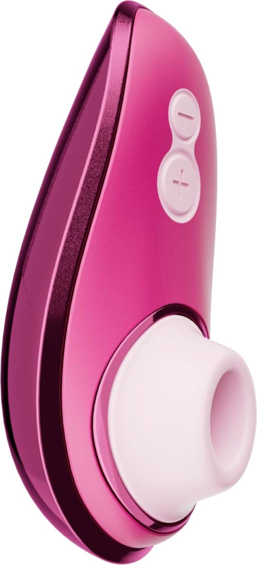 A pink and white personal soothing device with two buttons and a large white part, likely for water therapy or massage.