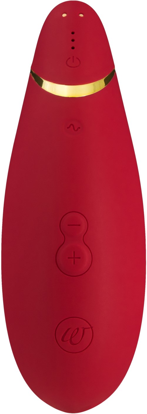 A red, egg-shaped personal massager with control buttons, a gold band, and a small speaker grille near the top.