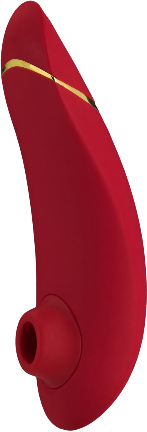 A red wireless earbud with a gold stripe and a small speaker hole.