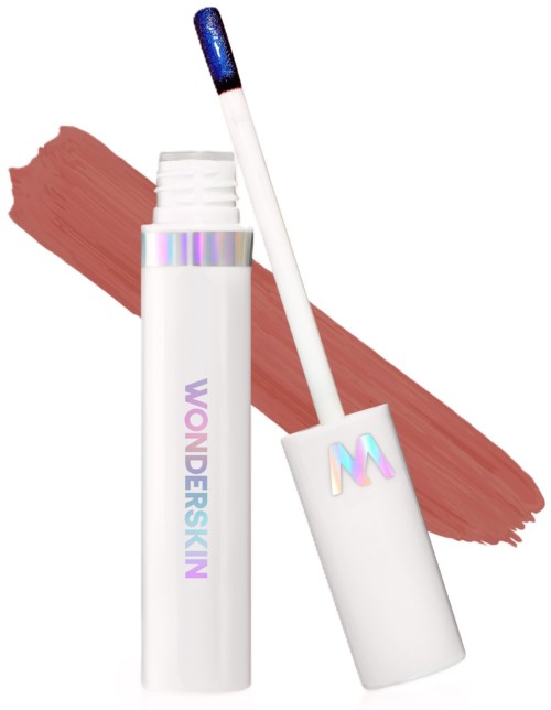 Lip gloss in a white tube with a shiny, multicolored logo and a wavy brush applicator, against a brown streak background.