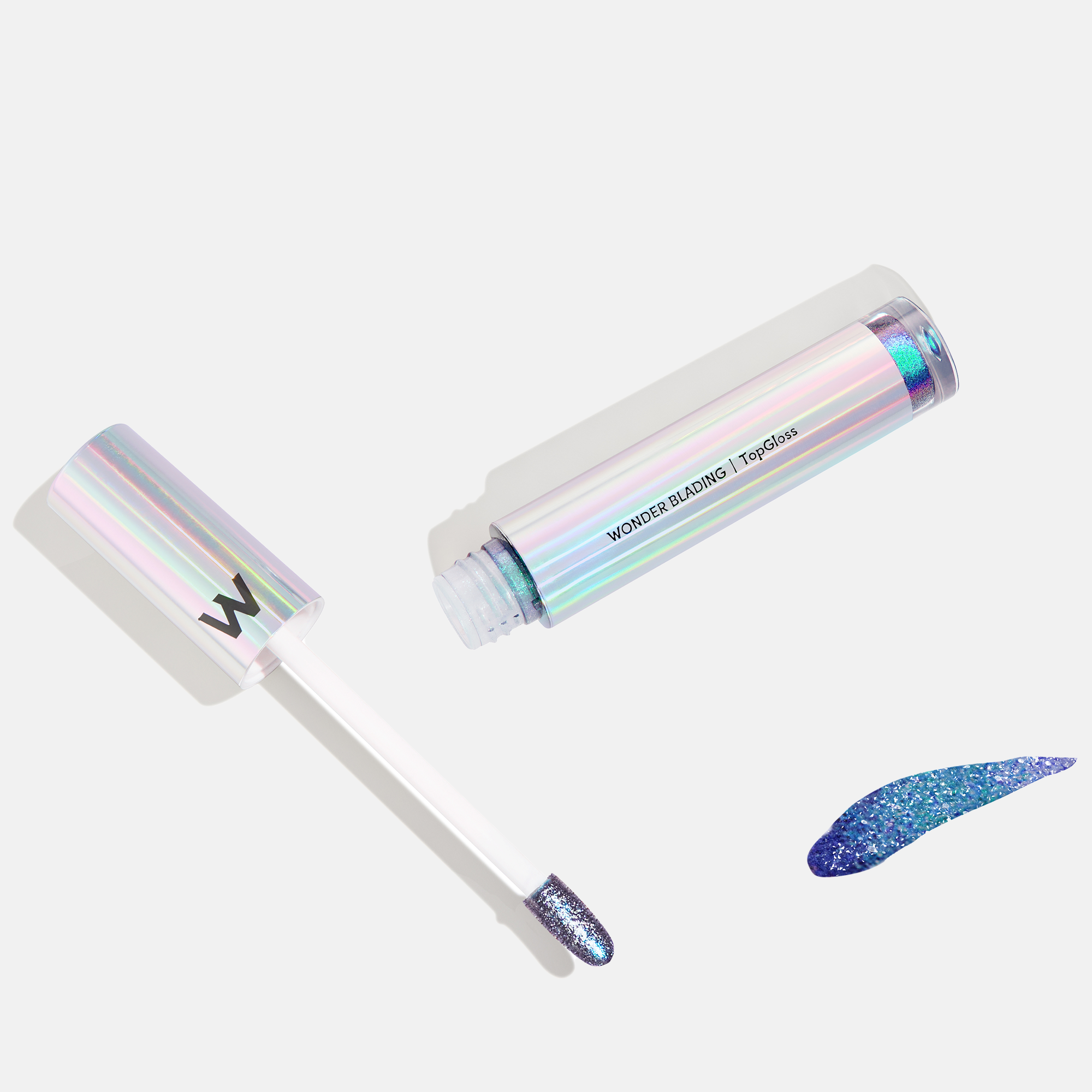 Wonderskin Wonder Blading Top Gloss - błyszczyk do ust Blue Glitter (obrázok 3)