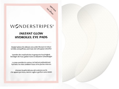 Wonderstripes Instant Glow Hydrogel Eye Pads -paketti, vieressä kaksi silmään laitetta.