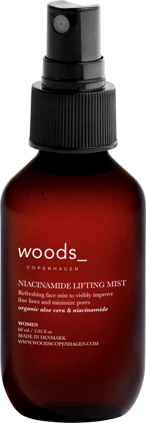 En mørkerød sprayflaske mærket Woods Copenhagen Niacinamide Lifting Mist til kvinder. Den fugter og forbedrer hudens linjer.