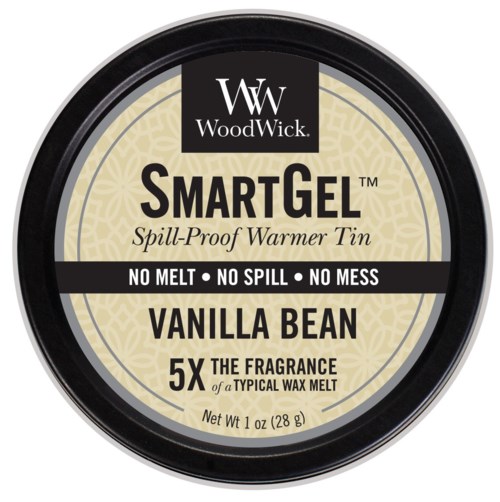 Ett runt förpackning med WoodWick-logga och doften Vaniljböna. Det är en spillfri varmtrådsbehållare utan städning.