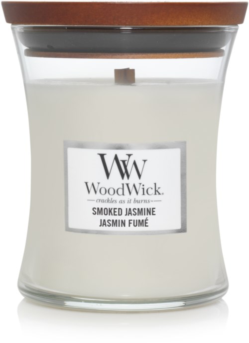 Ett doftljus i en glasburk med lock i trä. Etiketten säger att det är jasmine-doftande av WoodWick.