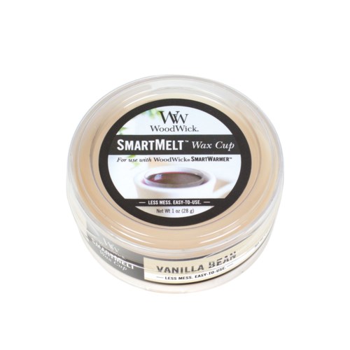 En liten behållare med vaniljbönsvax för vaxning och användning i varmare. Märket är WoodWick SmartMelt.