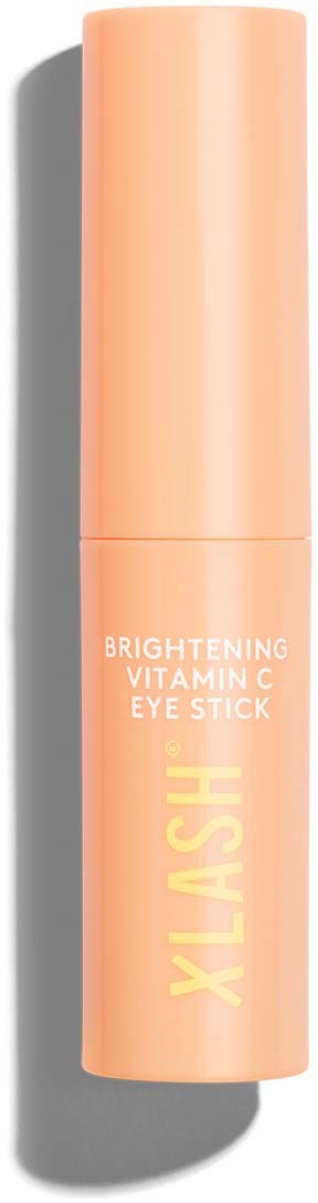 Persikanvärinen silmänympärystikki, jossa on valkoinen ja keltainen teksti, nimeltään kirkastava C-vitamiini.