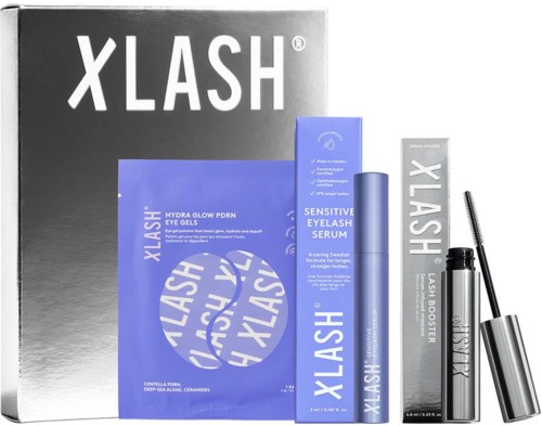 Xlash huidverzorgingsset bevat gel, serum en booster in blauwe verpakking met witte tekst.