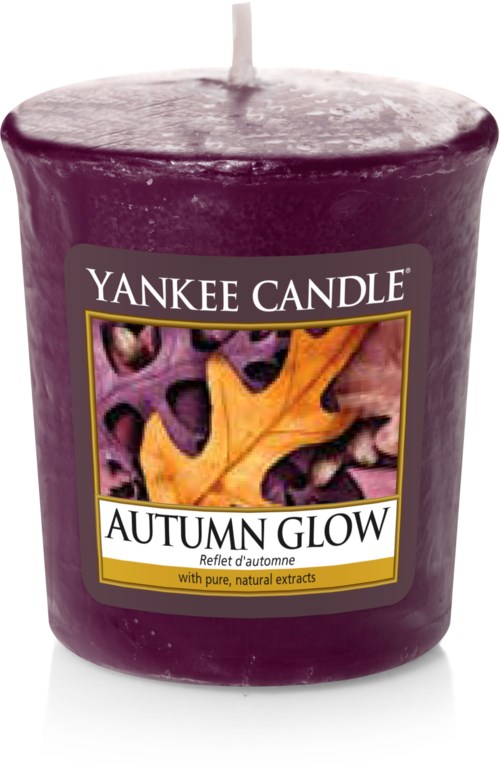 Lilla lys med etiket af efterårets blade og teksten "Autumn Glow".