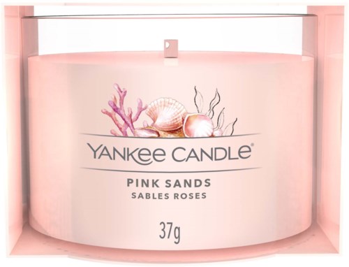 En Yankee Candle märkt 'Pink Sands' med bilder av rosa koraller och snäckor, och vikten 37g.