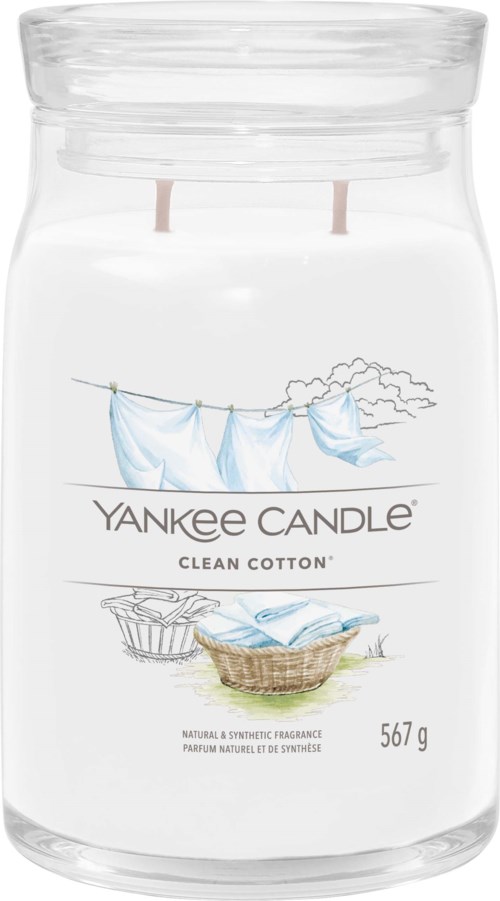 Ein Yankee Candle-Glas mit dem Duft von reinem Baumwolle, mit Zeichnungen von Wäsche und einem Korb.