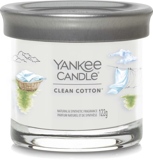 A Yankee Candle jar labeled 'Clean Cotton' with illustrations of laundry items and a silver lid.