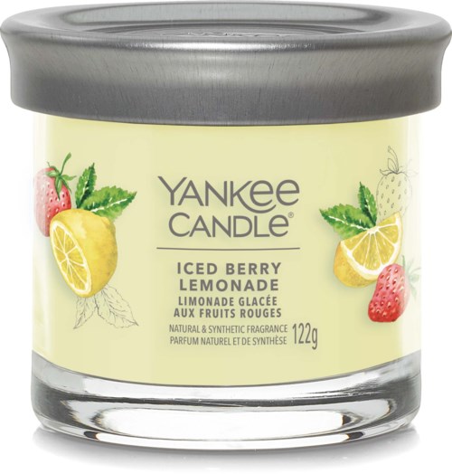 A Yankee Candle with a light yellow label, lemon, strawberry, and lemon slices, and a gray lid.