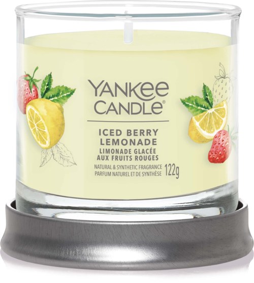A Yankee Candle with a lemon and strawberry on the label, suggesting a fruity, lemony scent. It is in a clear glass holder.